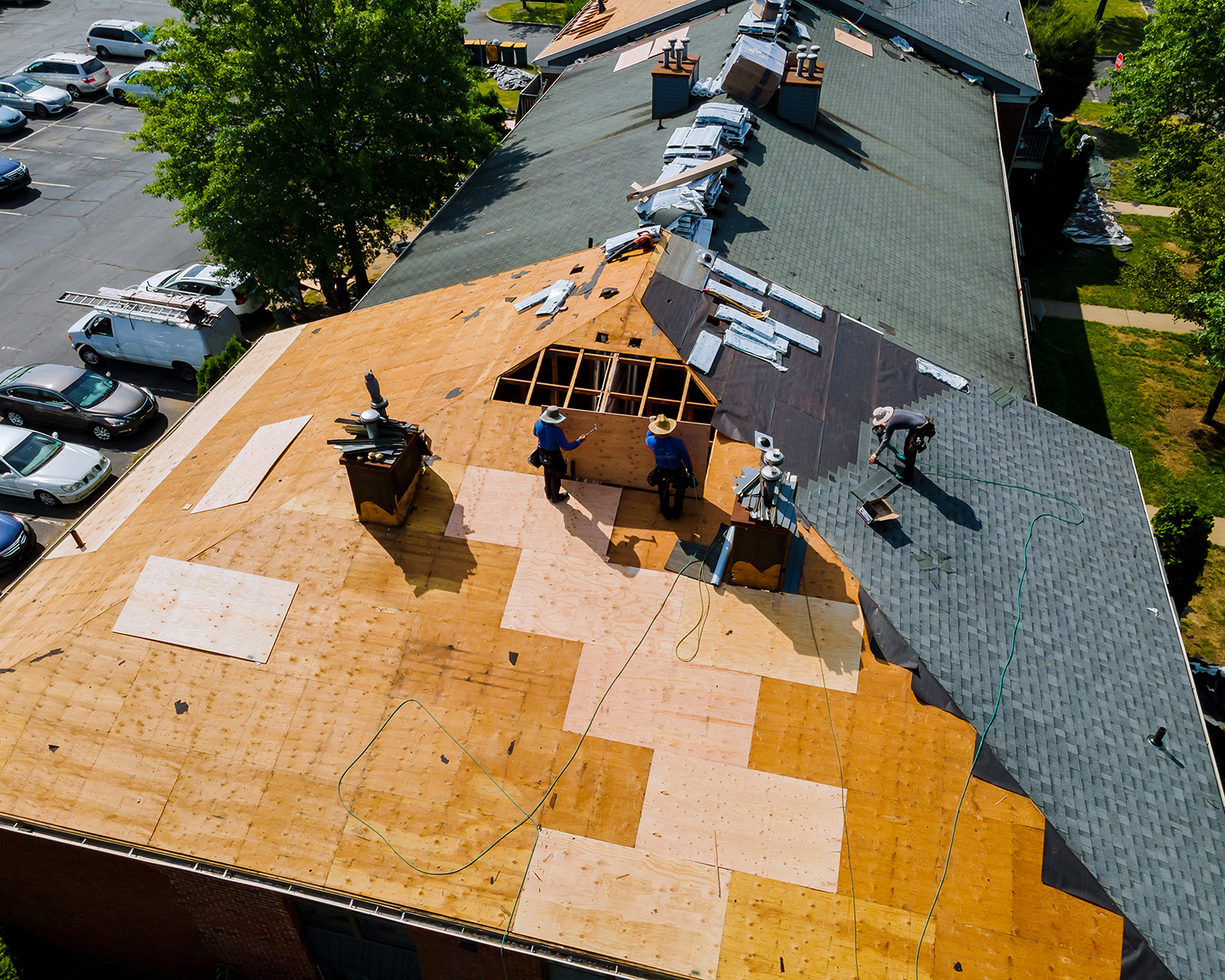 Construction worker on a renovation roof the house installed new shingles